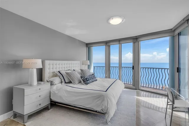 a view of a livingroom with furniture and window