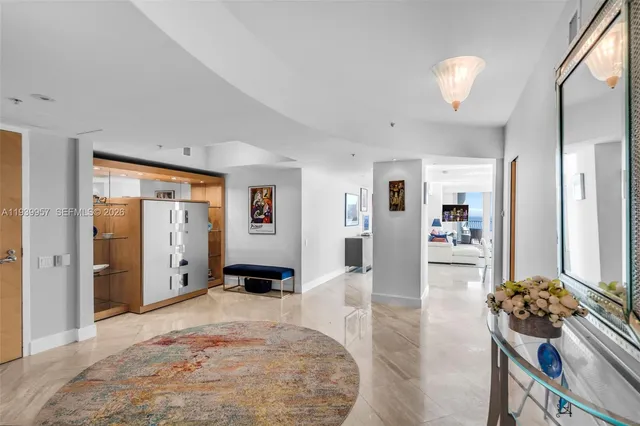 a view of a city that has tall trees