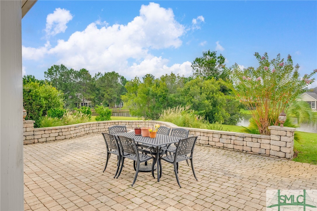 5 Reed Grass Lane Savannah, GA 31405 - Photo 42 of 47 Large paver patio with firepit and privacy wall, b