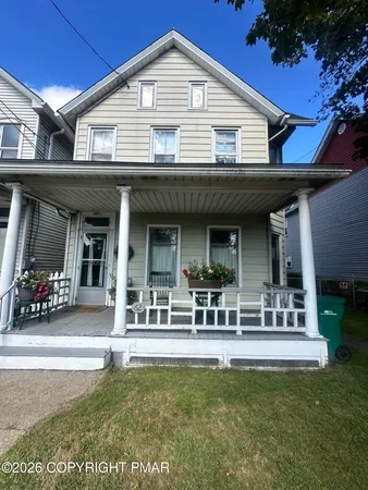 a view of a house with patio