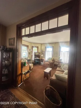 a room with lots of chairs and a table