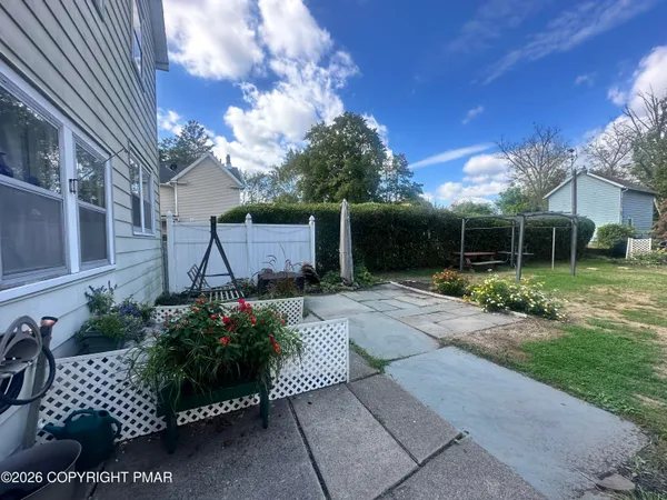 a view of a garden with potted plants