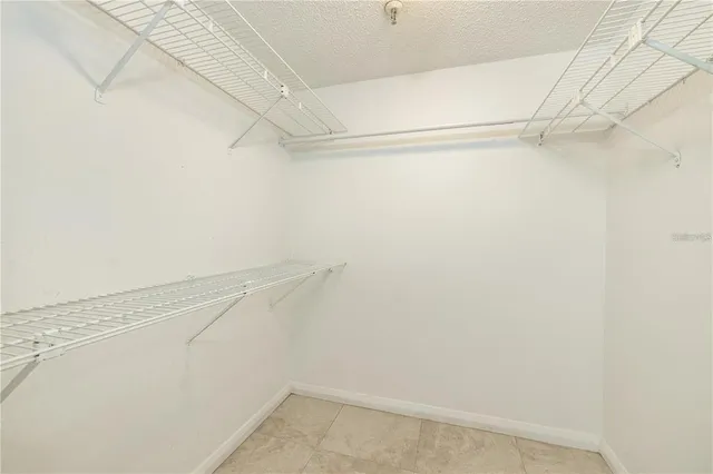 a view of a room with racks on the wall