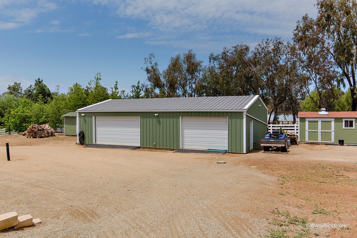 3111 Brookside Lane Encinitas, CA 92024 - Photo 19 of 25 Approx 1,500sqft barn with half bath and 2 roll up sectional garage doors.