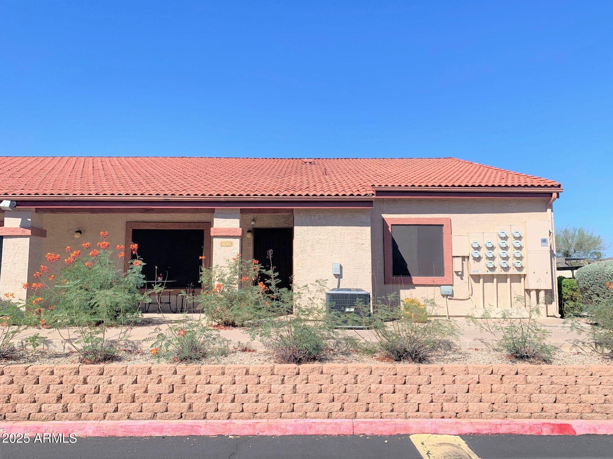 1440 North Idaho Road, Unit 1019 Apache Junction, AZ 85119 - Photo 11 of 14 front view of a house