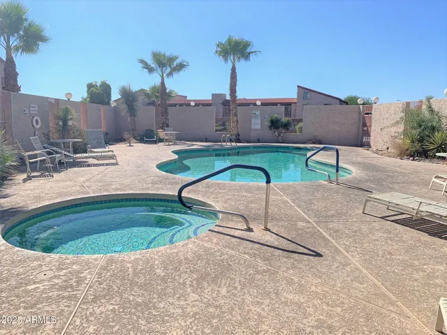 an aerial view of a house with swimming pool