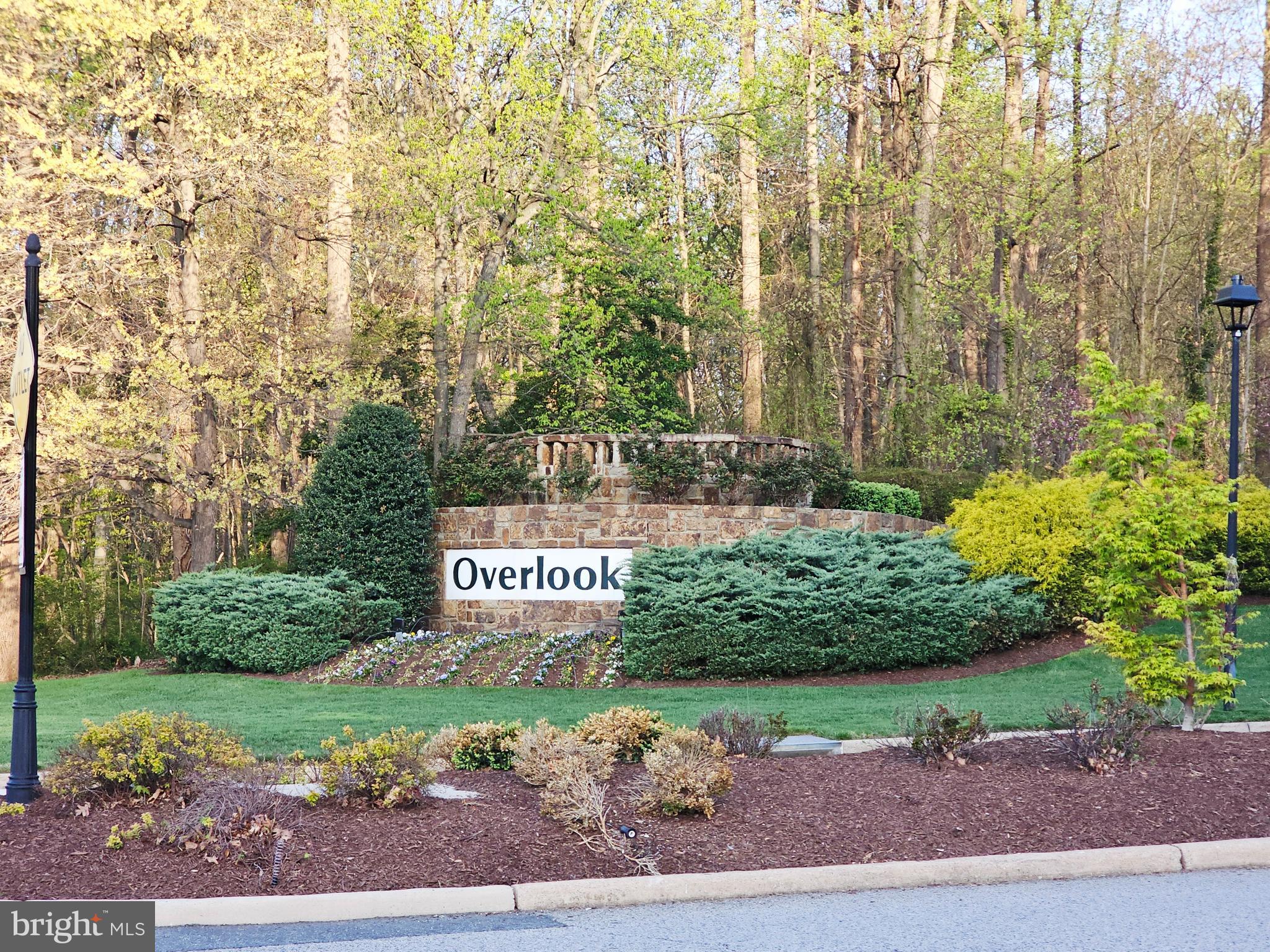 6338 Eagle Ridge Lane, Unit A Alexandria, VA 22312 - Photo 25 of 68 a sign on the side of a road