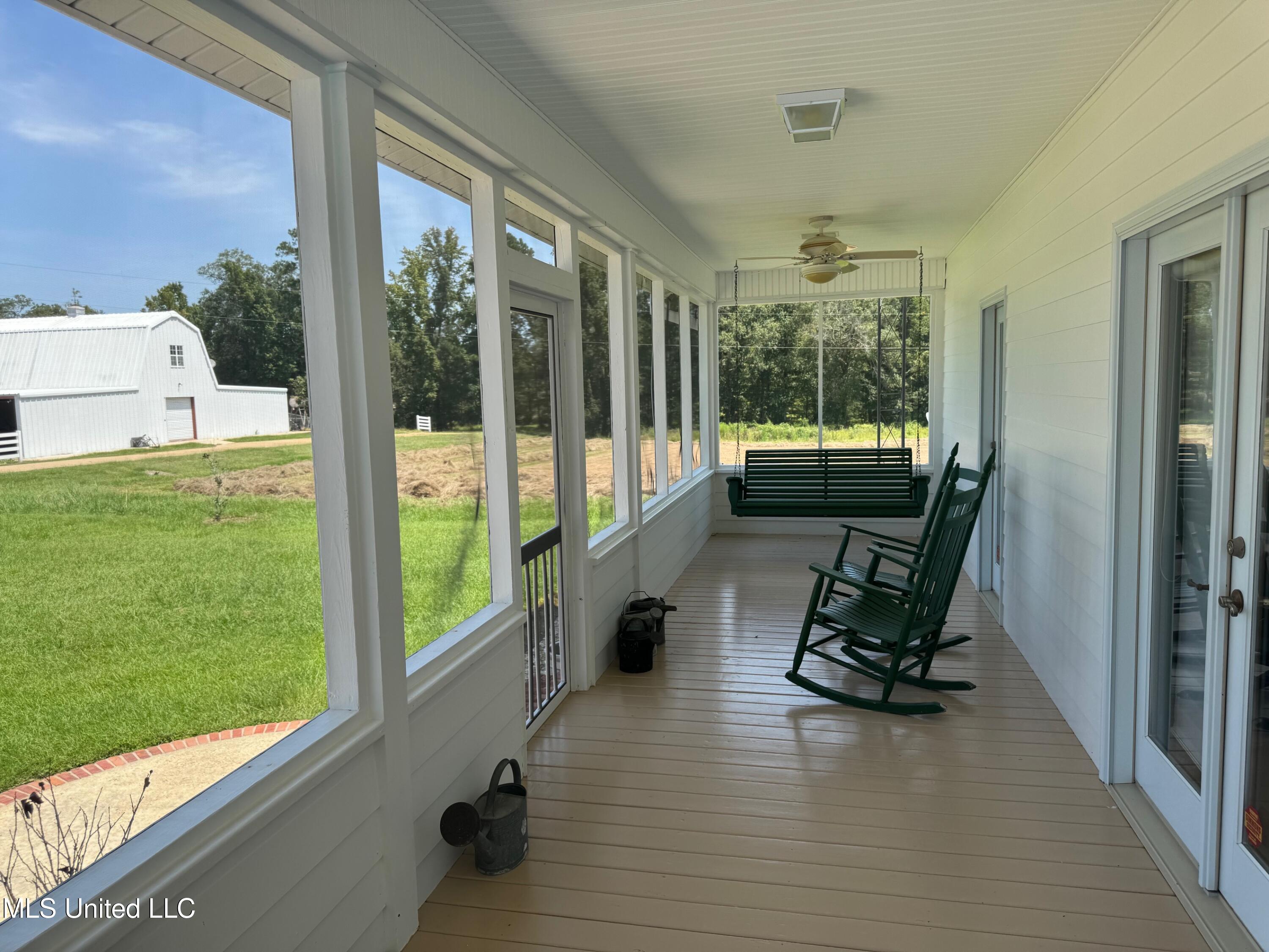 2053 Osyka Progress Road Osyka, MS 39657 - Photo 19 of 49 RG - Back porch to barn