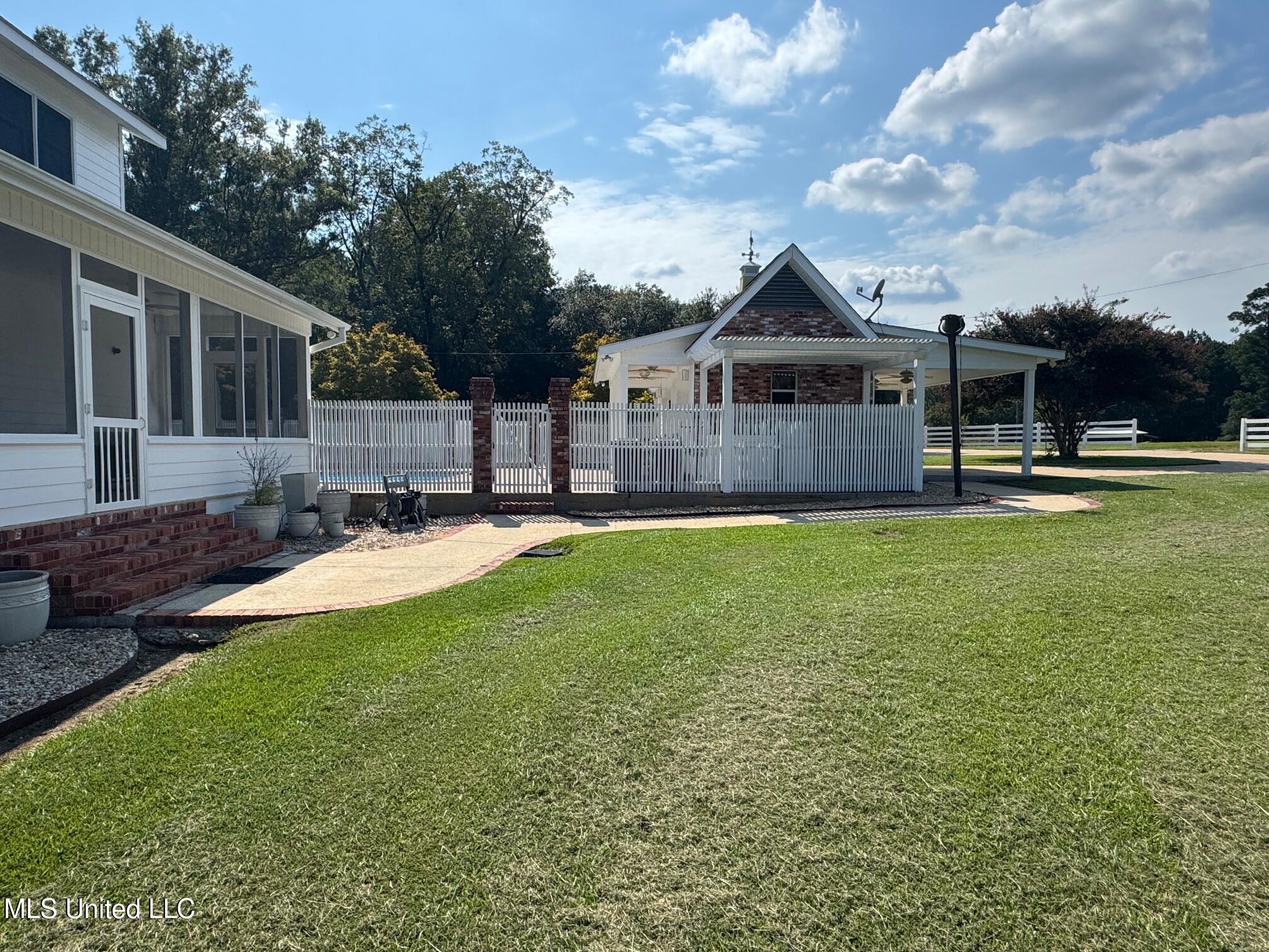 2053 Osyka Progress Road Osyka, MS 39657 - Photo 26 of 49 RG - Rear and bath house