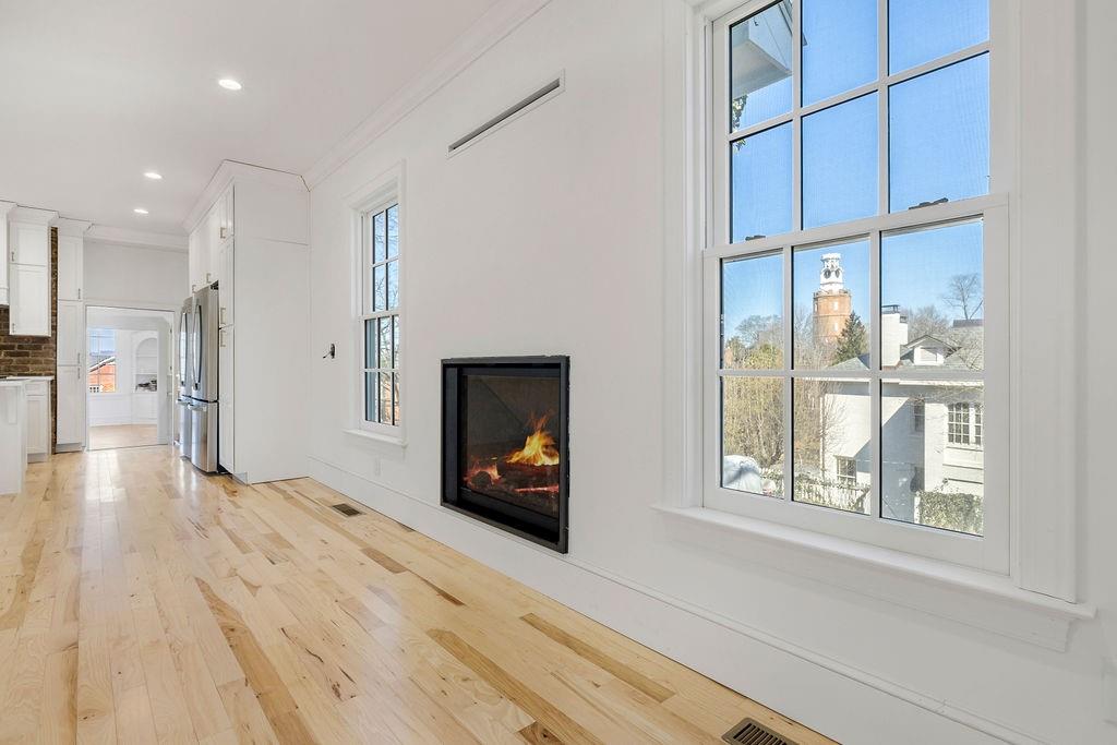 312 East 3rd Street Rome, GA 30161 - Photo 16 of 42 a view of an empty room with a window and fire place