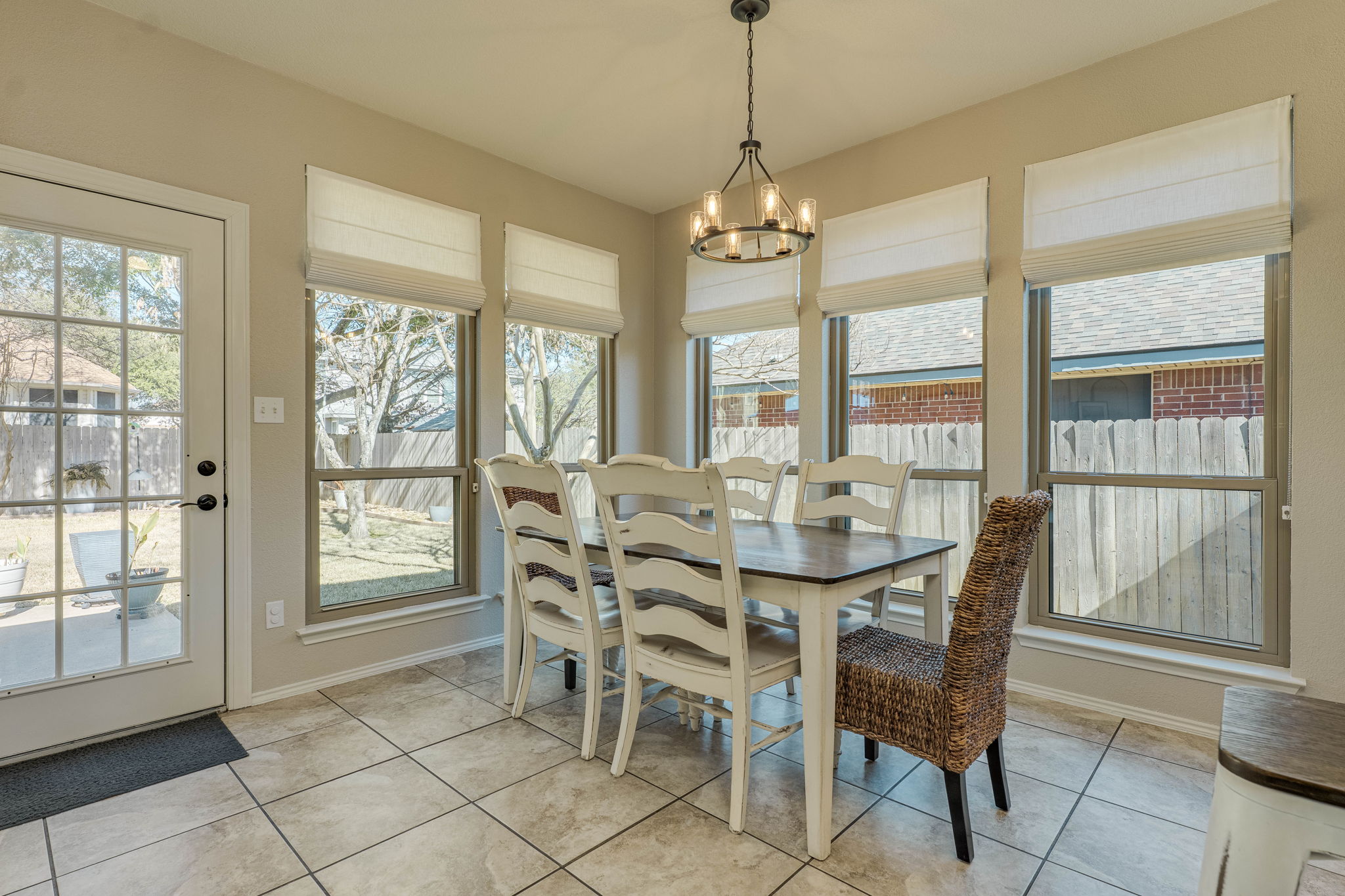 703 Ridge View Drive Leander, TX 78641 - Photo 13 of 39 Dining room featuring hanging lights and light tile patterned floors