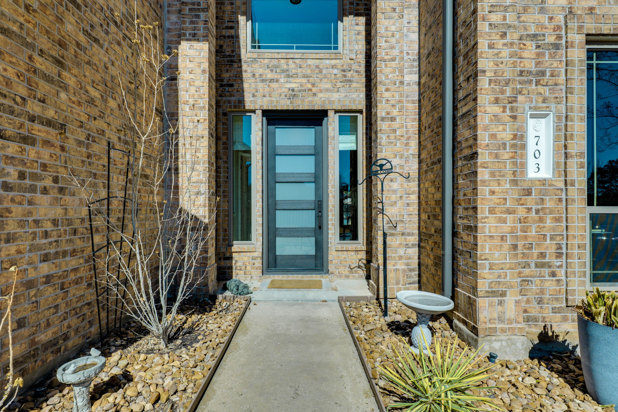 703 Ridge View Drive Leander, TX 78641 - Photo 2 of 39 View of exterior entry with brick siding