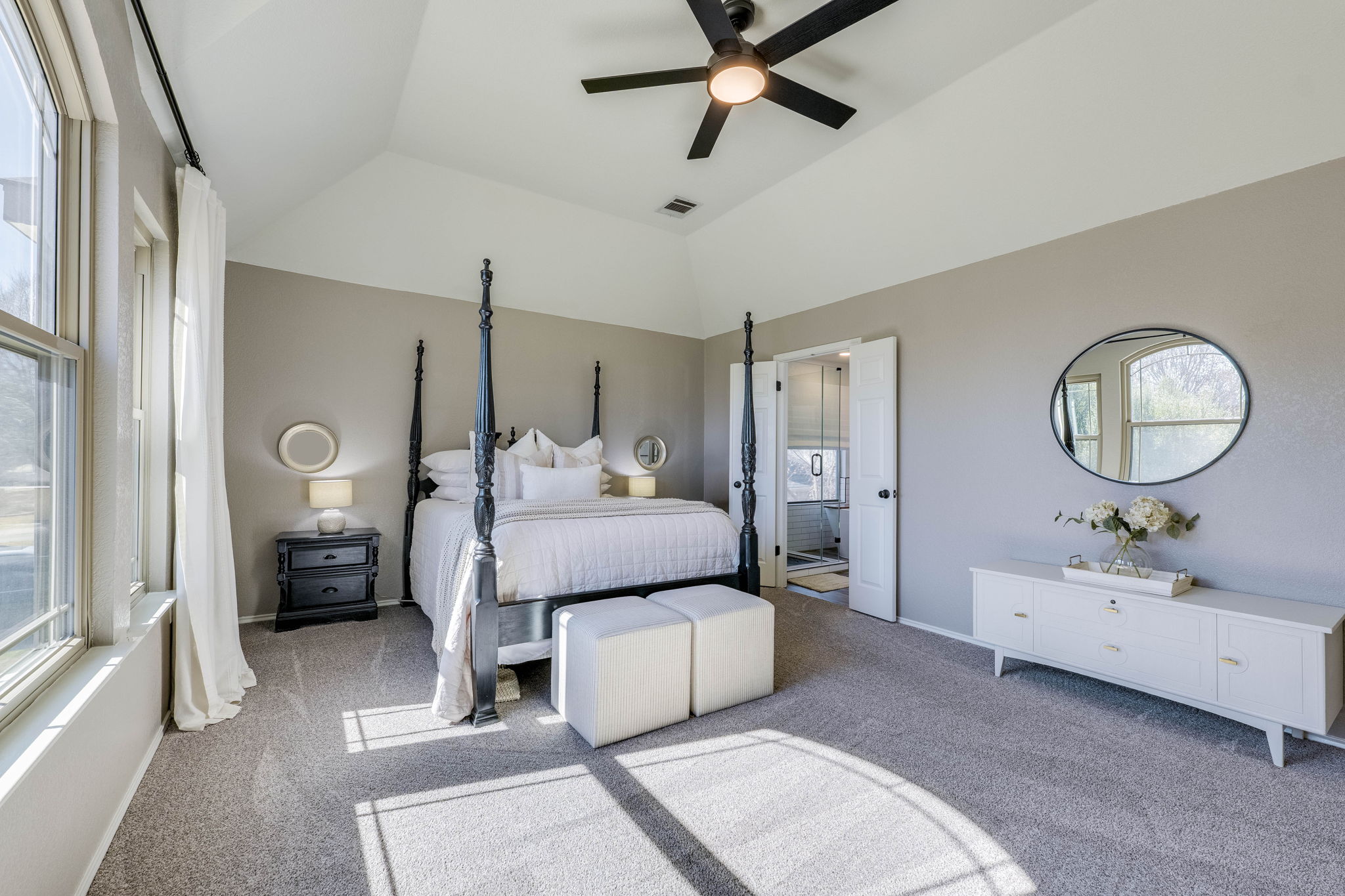 703 Ridge View Drive Leander, TX 78641 - Photo 28 of 39 Carpeted bedroom with a ceiling fan, ensuite bathroom, and vaulted ceiling