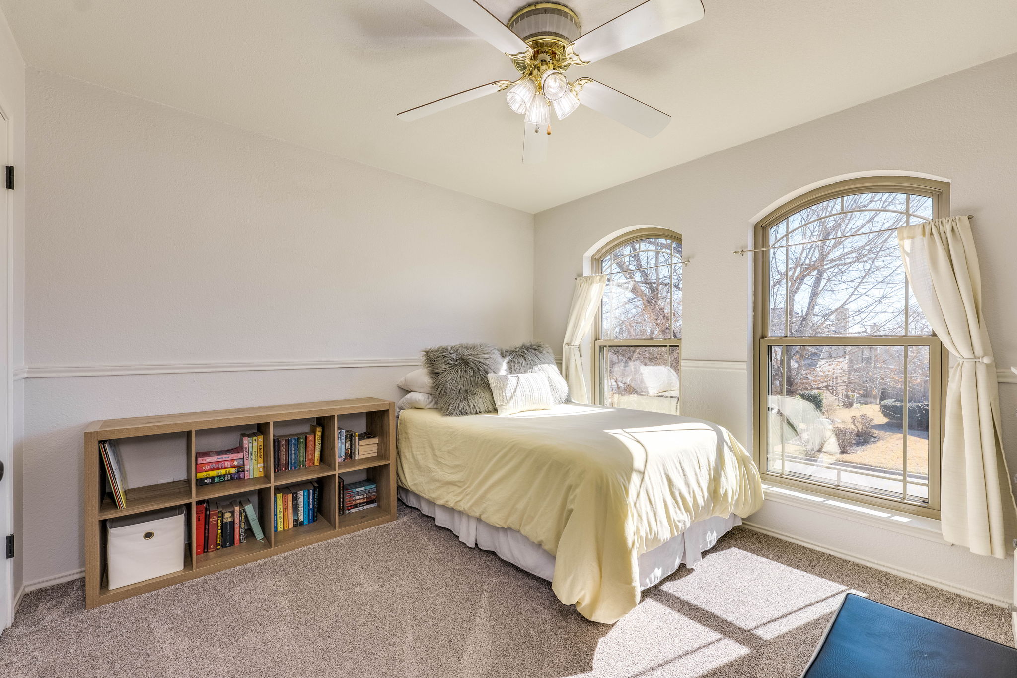 703 Ridge View Drive Leander, TX 78641 - Photo 33 of 39 Carpeted bedroom featuring a ceiling fan and baseboards