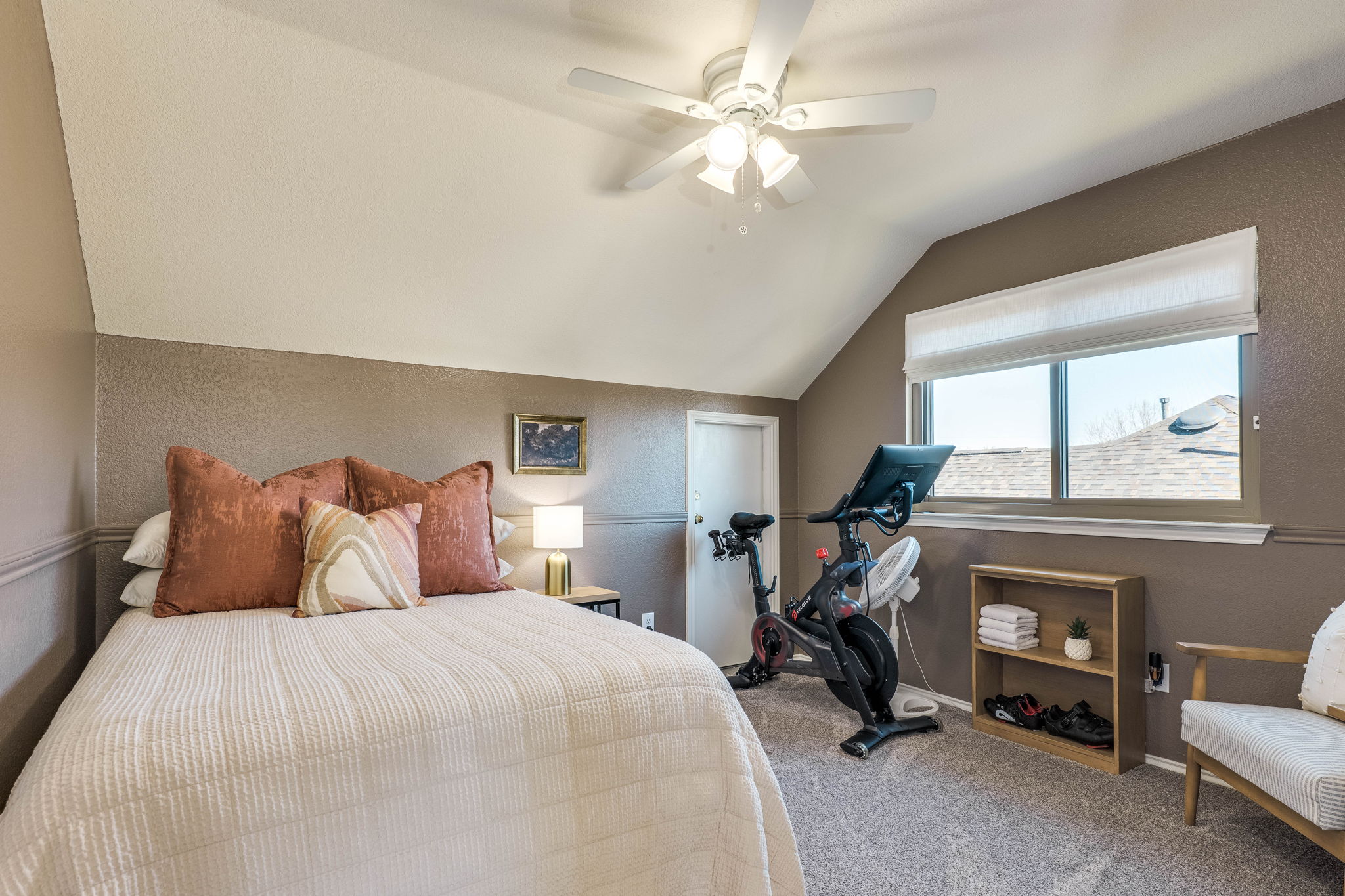 703 Ridge View Drive Leander, TX 78641 - Photo 34 of 39 Bedroom with lofted ceiling, carpet flooring, ceiling fan, and a textured wall