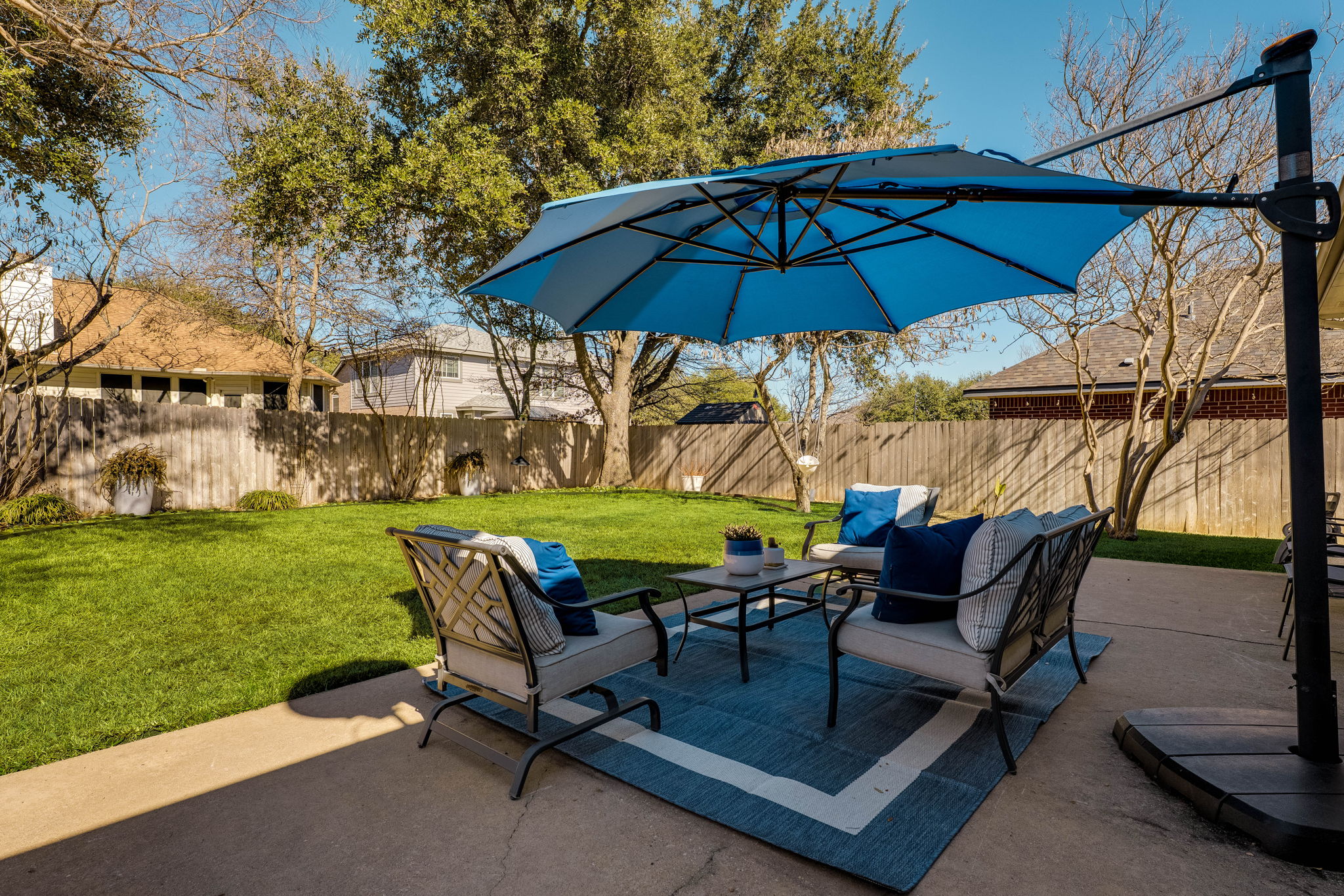 703 Ridge View Drive Leander, TX 78641 - Photo 36 of 39 Fenced backyard featuring an outdoor hangout area and a patio area
