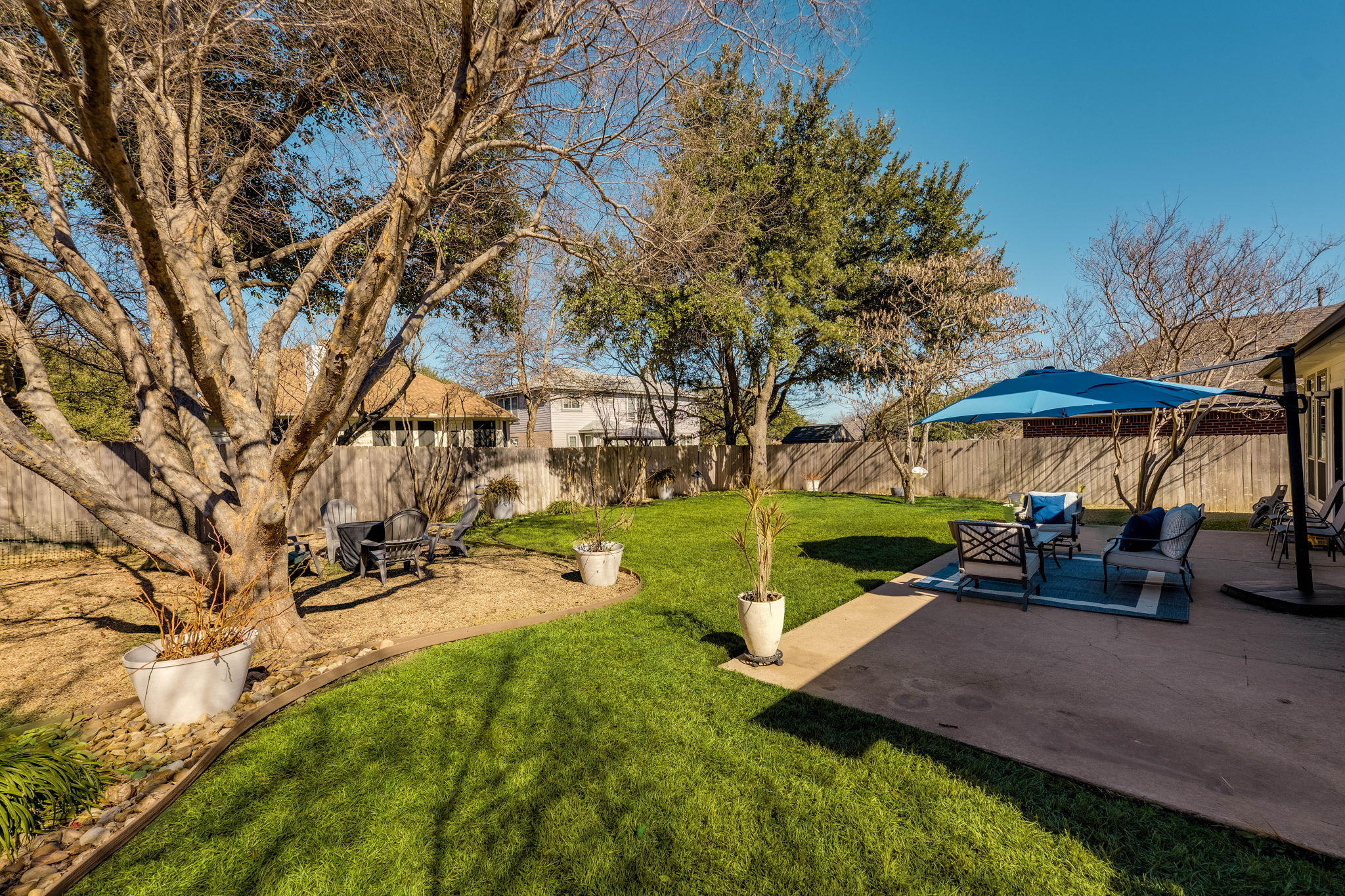 703 Ridge View Drive Leander, TX 78641 - Photo 37 of 39 Fenced backyard featuring a patio and a fire pit