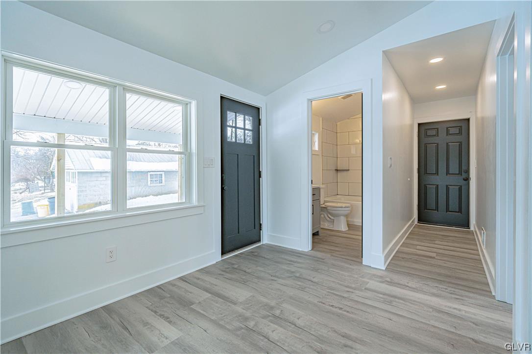 677 Gall Road Nazareth, PA 18064 - Photo 13 of 27 an empty room with wooden floor and windows