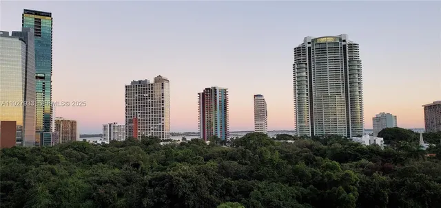 a view of a city with tall buildings