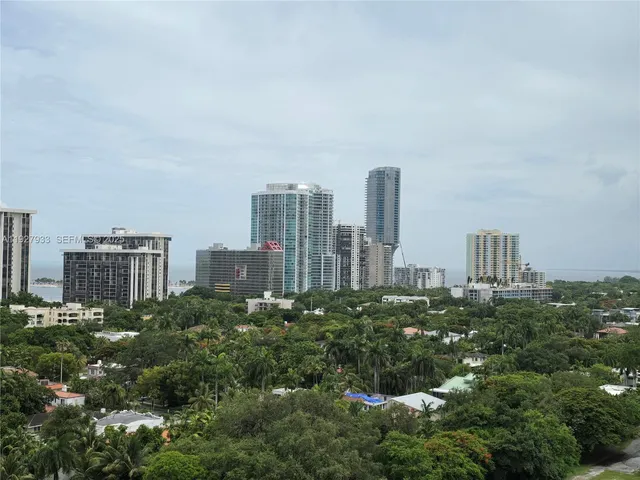 a view of a city with tall buildings