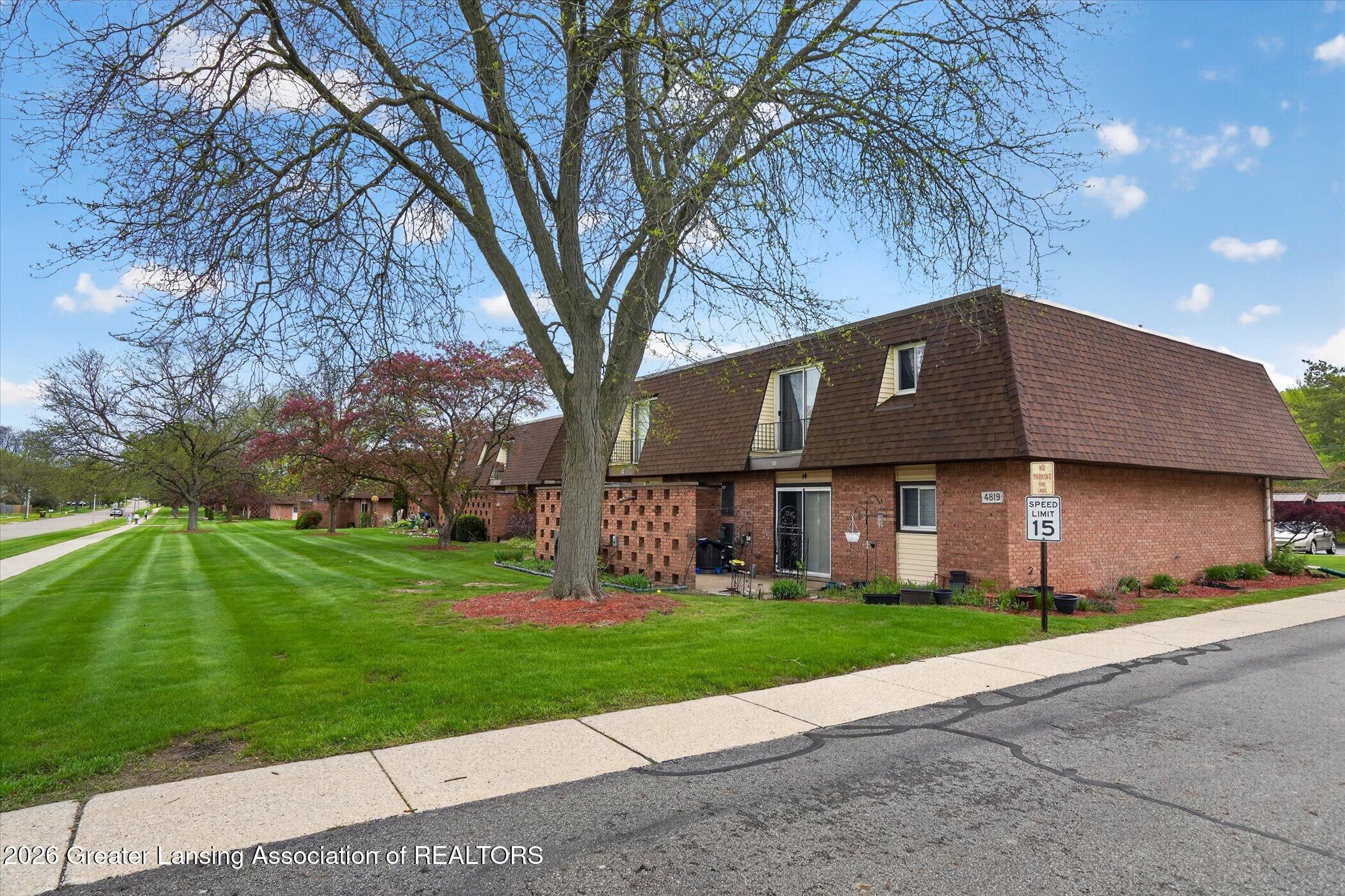 4809 Gull Road, Unit 23 Lansing, MI 48917 - Photo 26 of 26 26-4809-Gull-Rd-apt-23-WindowStill-Real-