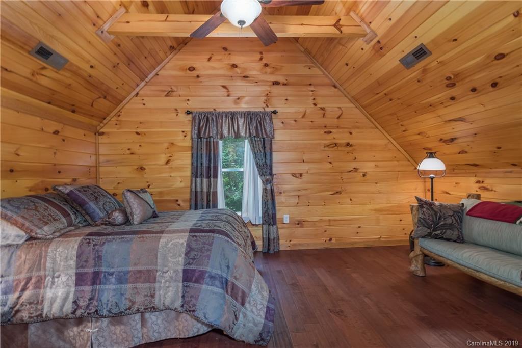 83 Cross Ridge Drive Rutherfordton, NC 28139 - Photo 21 of 38 a bedroom with furniture and wooden floor