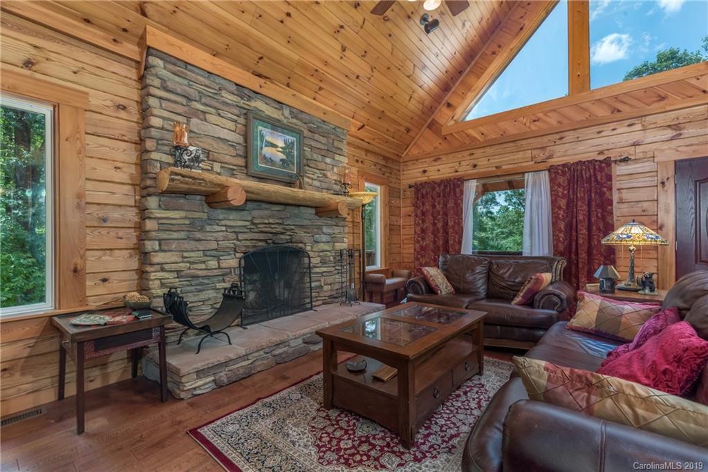 83 Cross Ridge Drive Rutherfordton, NC 28139 - Photo 23 of 38 a living room with furniture and a fireplace