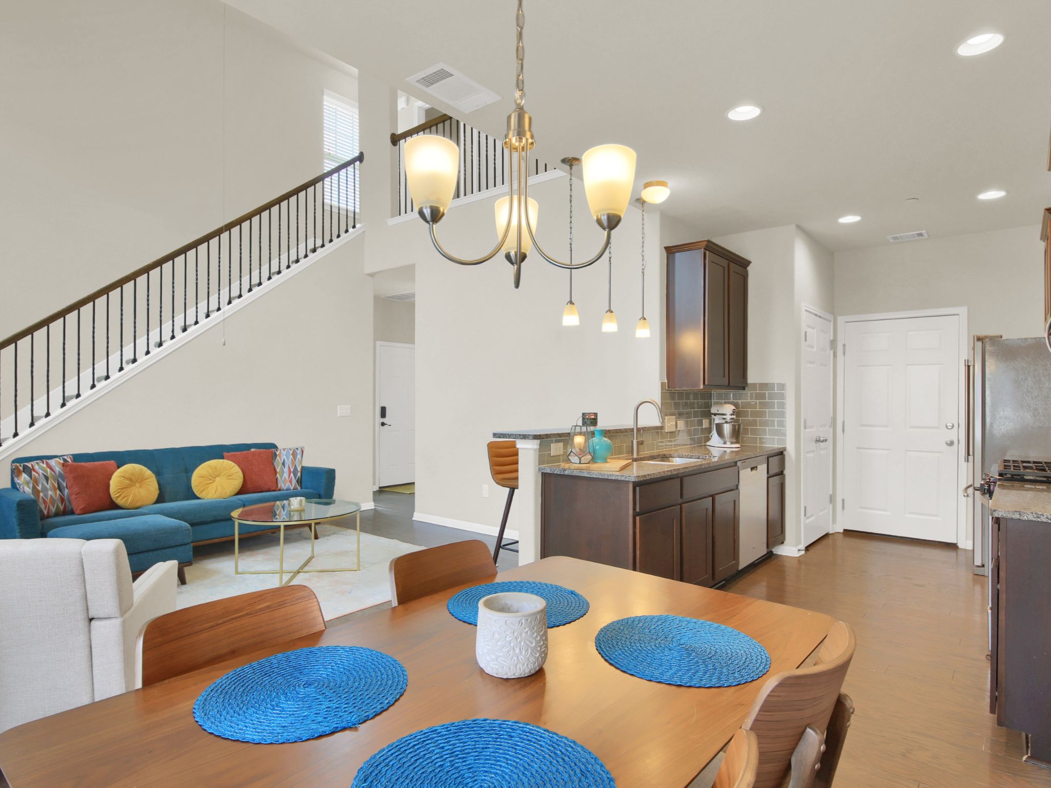 1600 Airedale Road, Unit 2601 Austin, TX 78748 - Photo 7 of 26 An open-concept design seamlessly connects the kitchen and dining areas to the living space.