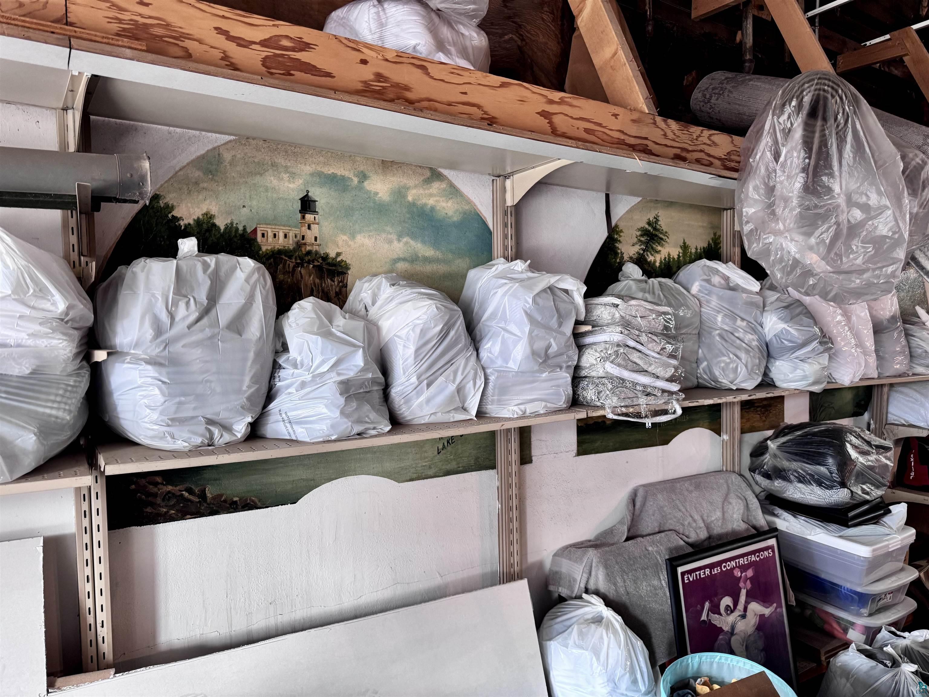 601 1st Avenue Two Harbors, MN 55616 - Photo 17 of 99 Featuring artist's paintings on the paster walls and STR inventory