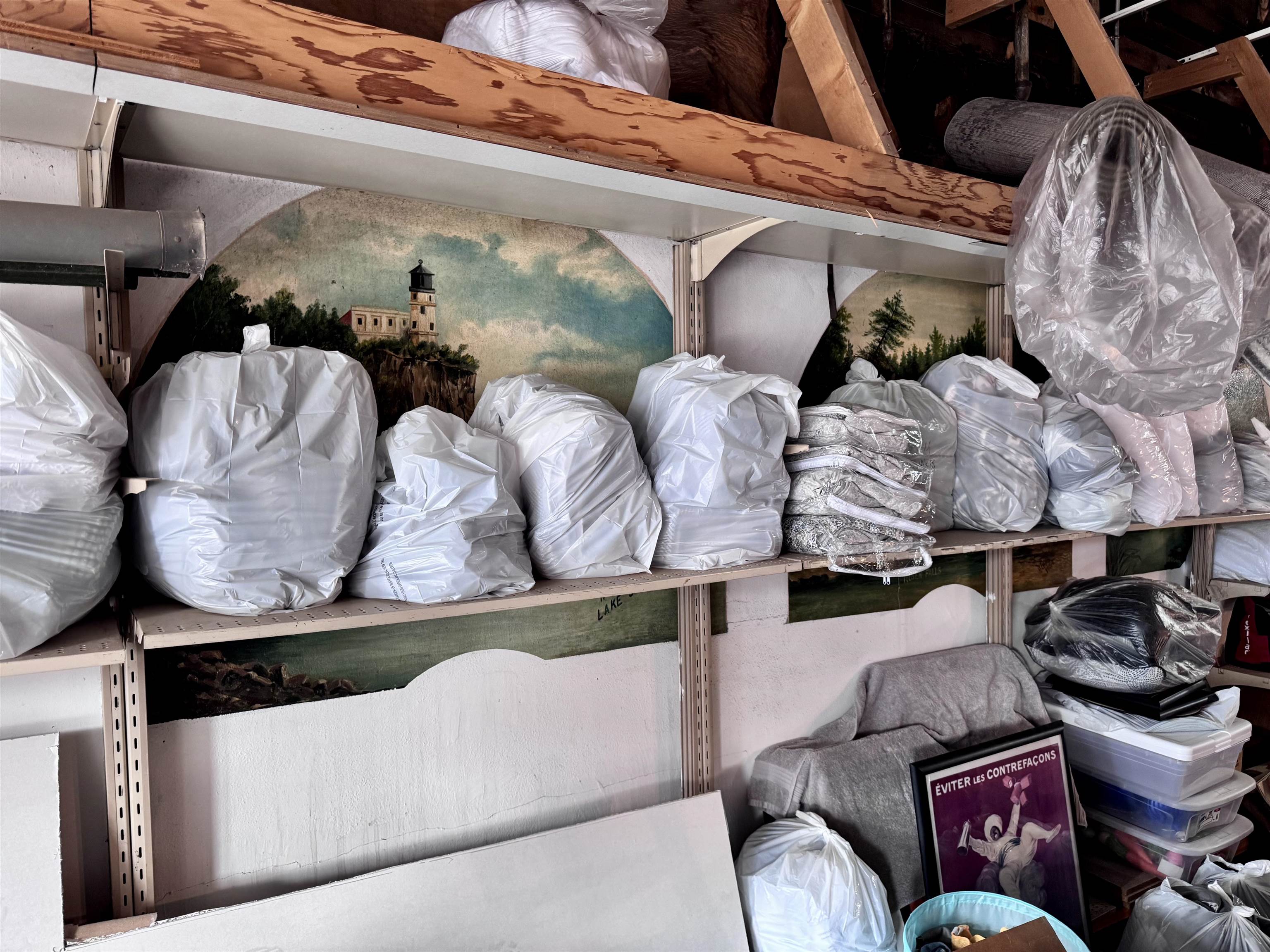 601 1st Avenue Two Harbors, MN 55616 - Photo 17 of 99 Featuring artist's paintings on the paster walls and STR inventory