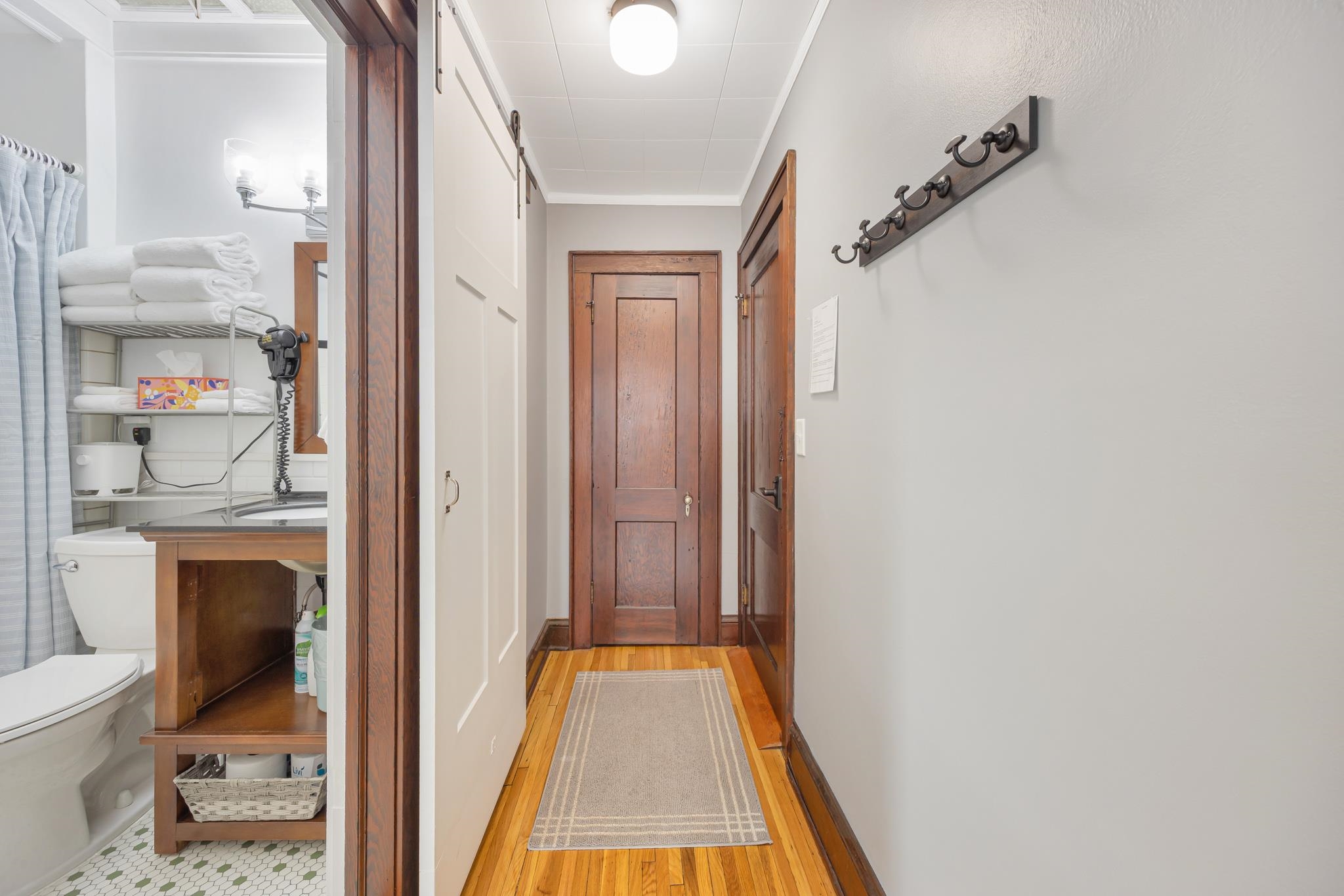 601 1st Avenue Two Harbors, MN 55616 - Photo 31 of 99 Featuring sliding barn door and original Douglas fir woodwork