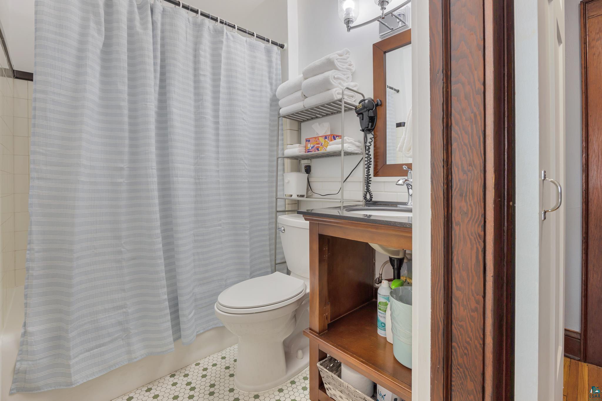 601 1st Avenue Two Harbors, MN 55616 - Photo 32 of 99 Featuring new toilet and sink