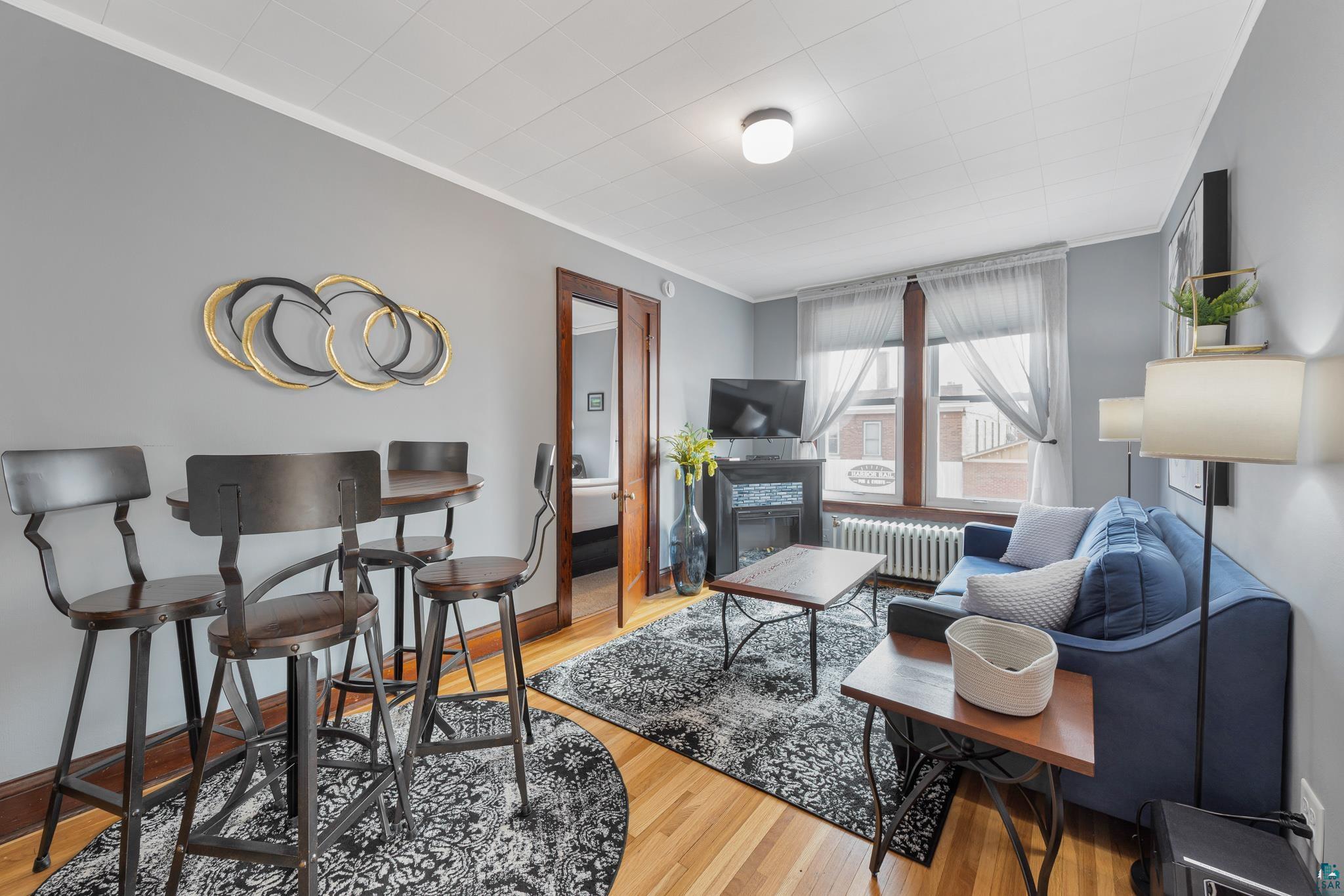 601 1st Avenue Two Harbors, MN 55616 - Photo 35 of 99 Featuring new windows and original light oak floors