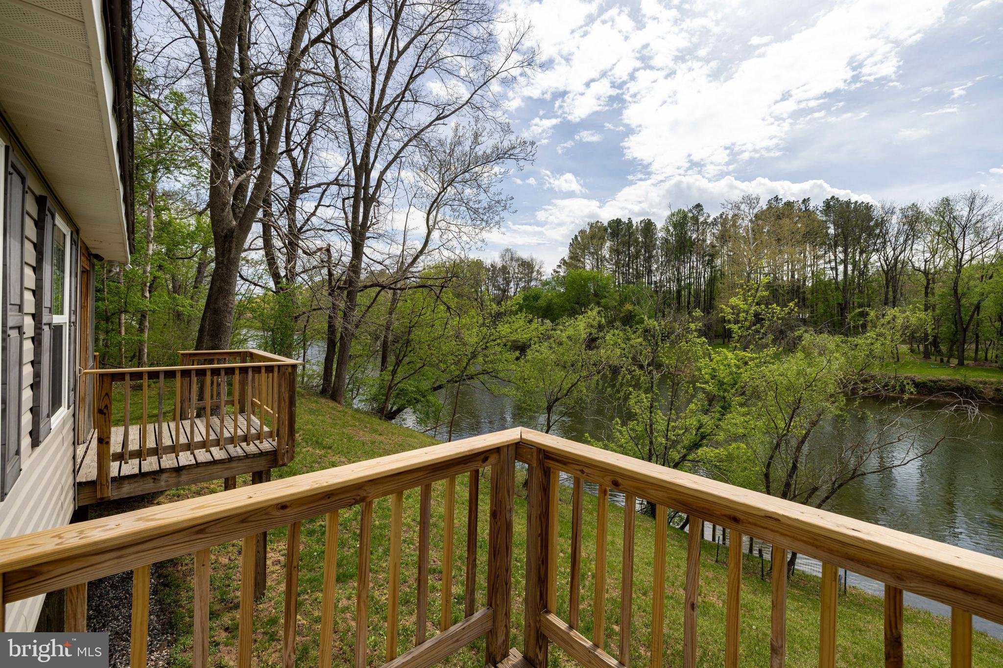 789 Mill Run Road Shenandoah, VA 22849 - Photo 40 of 76 a balcony with trees in front of it