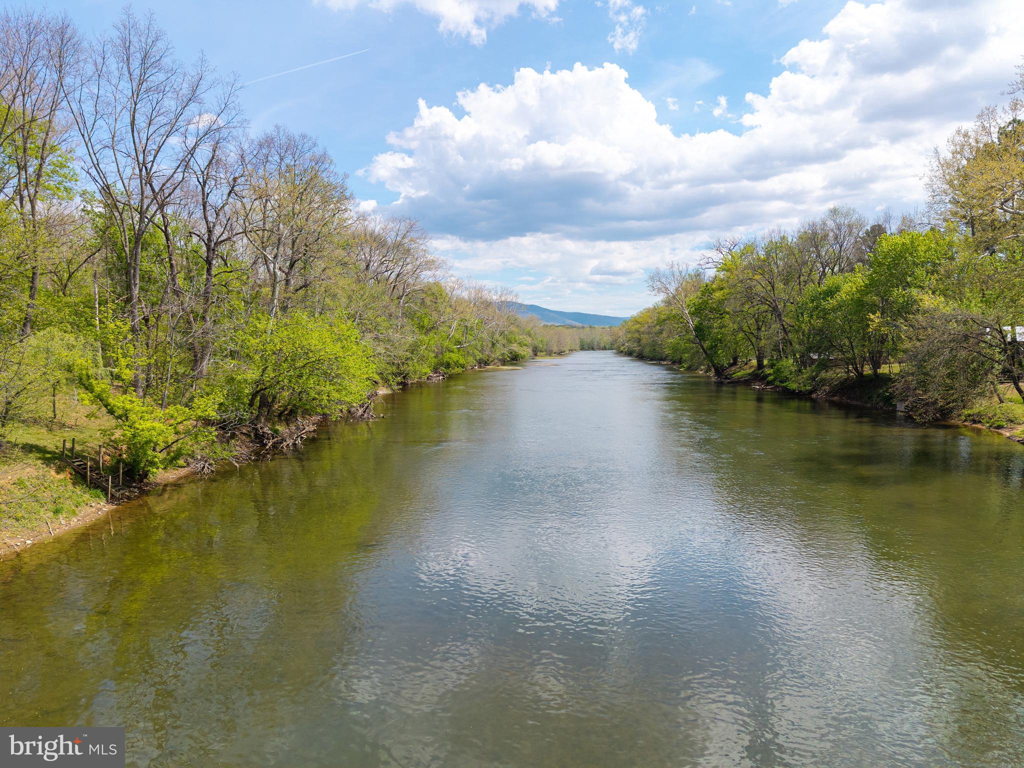 789 Mill Run Road Shenandoah, VA 22849 - Photo 54 of 76 a view of a lake with houses in the background