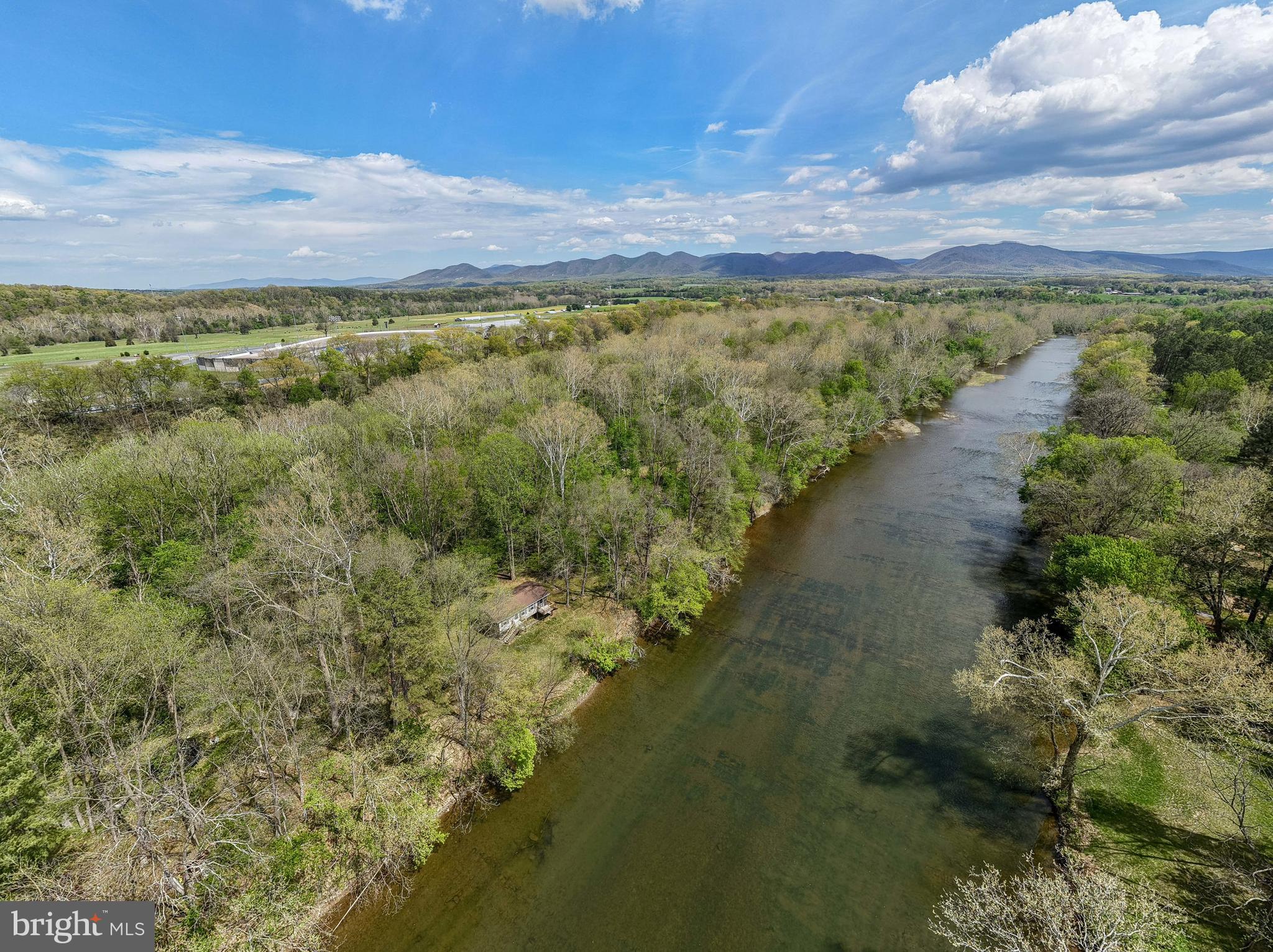 789 Mill Run Road Shenandoah, VA 22849 - Photo 58 of 76 a view of a lake with a mountain