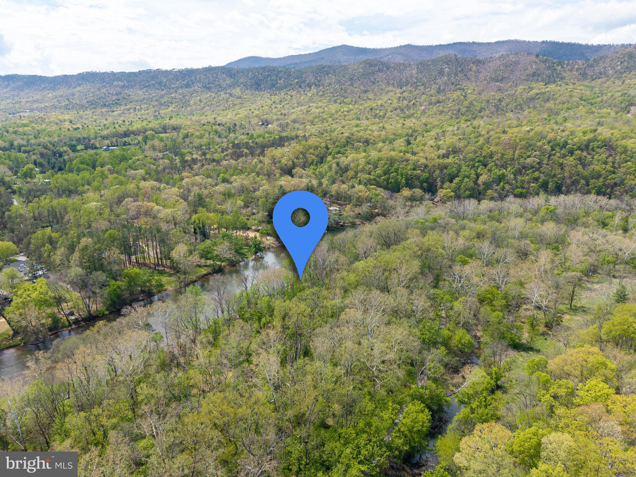 789 Mill Run Road Shenandoah, VA 22849 - Photo 75 of 76 a view of a lush green hillside and a houses