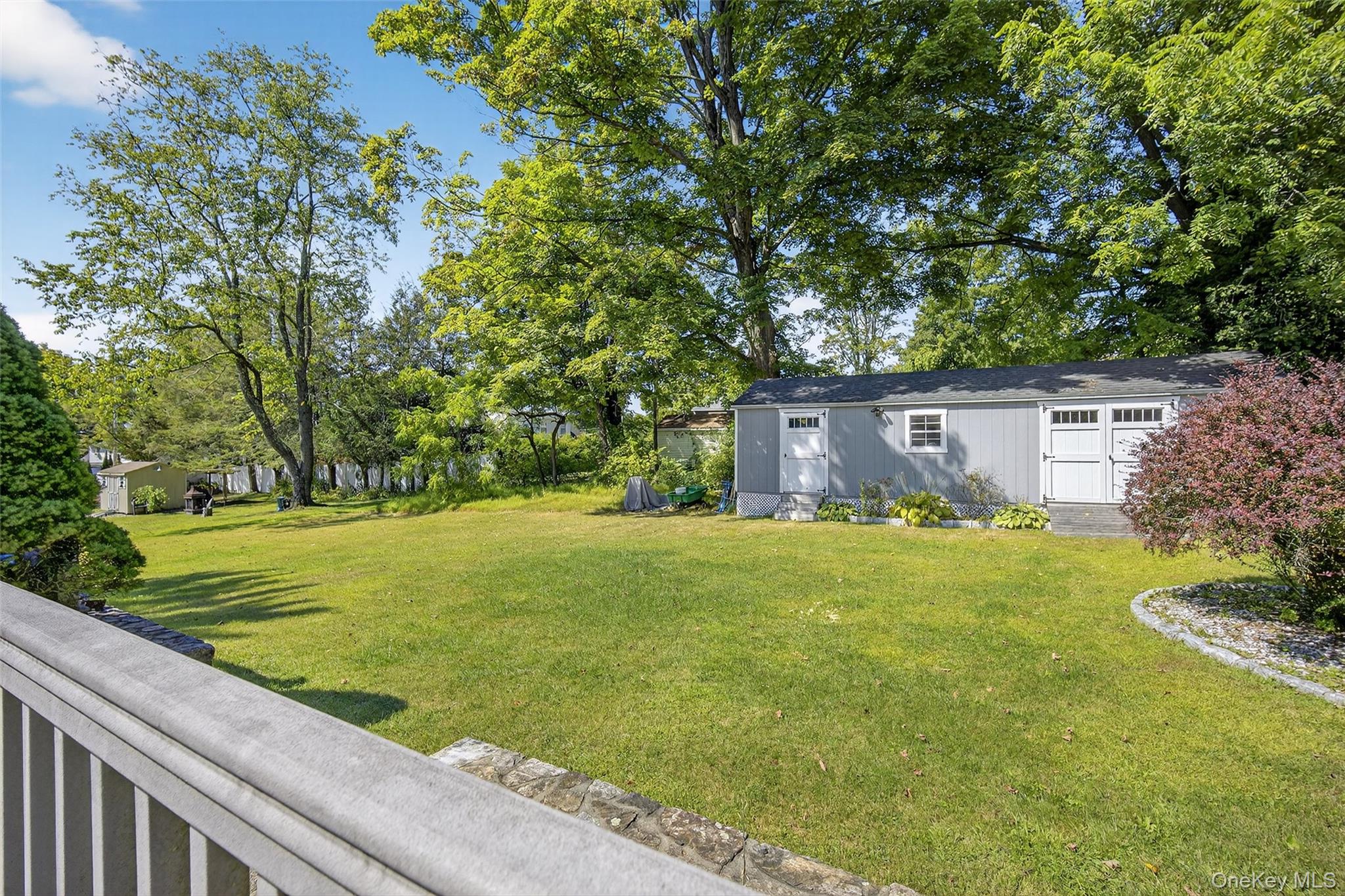24 Fairview Road Mahopac, NY 10541 - Photo 14 of 26 a view of a backyard with a garden