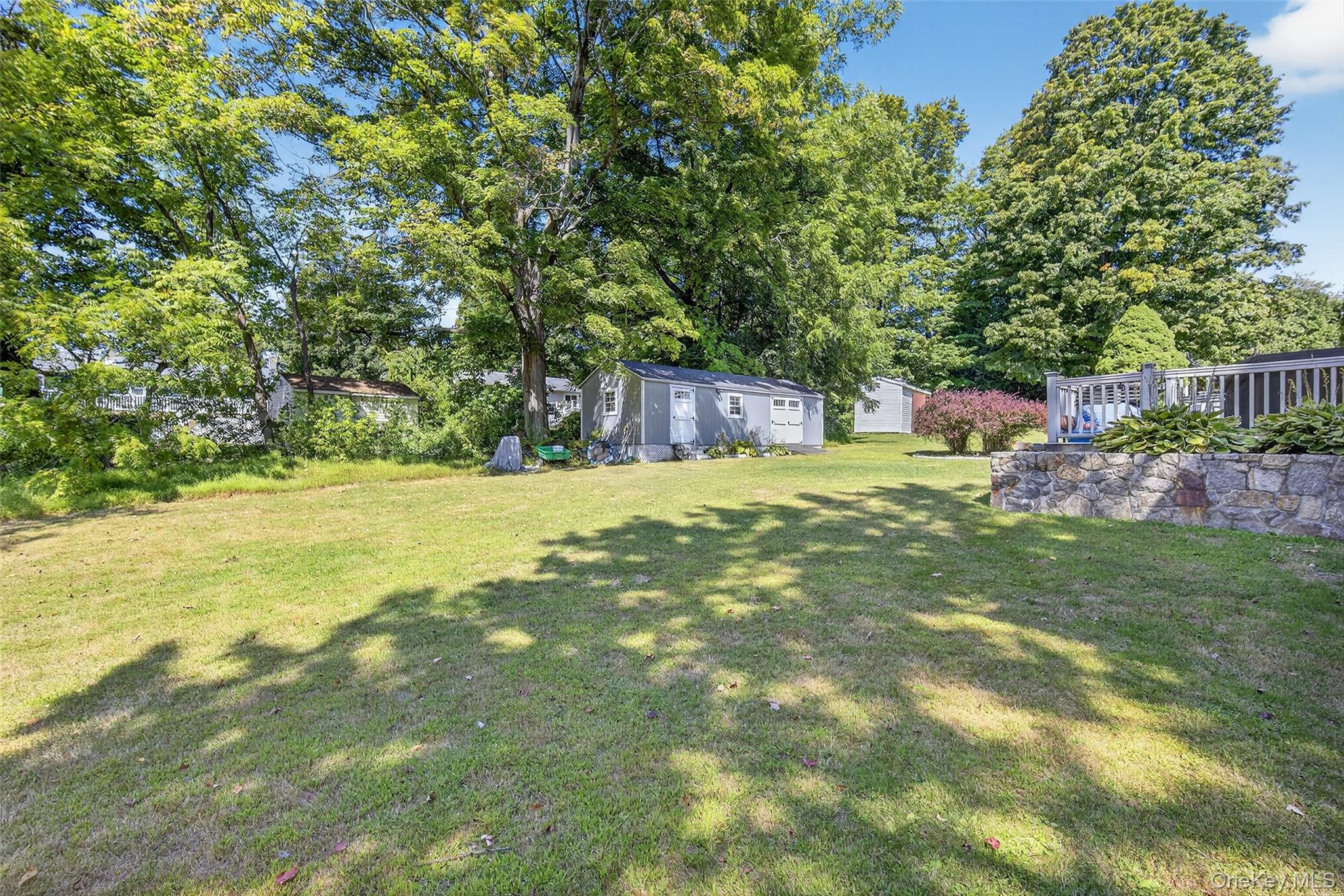 24 Fairview Road Mahopac, NY 10541 - Photo 15 of 26 a view of swimming pool with lawn chairs and plants
