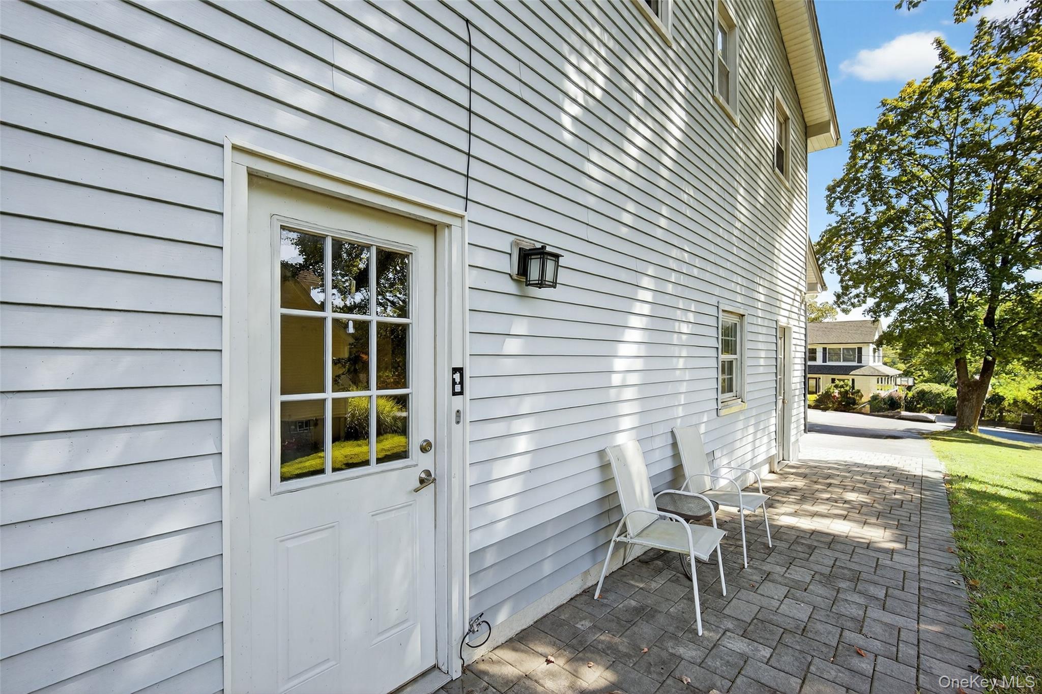 24 Fairview Road Mahopac, NY 10541 - Photo 16 of 26 a view of house with backyard and sitting area