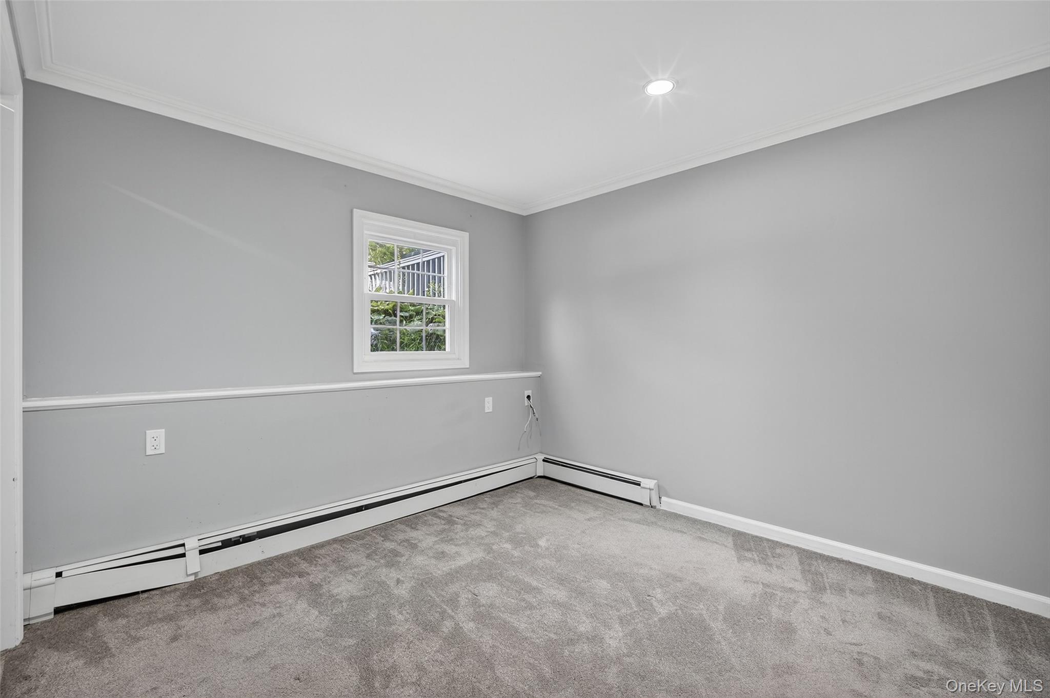 24 Fairview Road Mahopac, NY 10541 - Photo 8 of 26 an empty room with a window