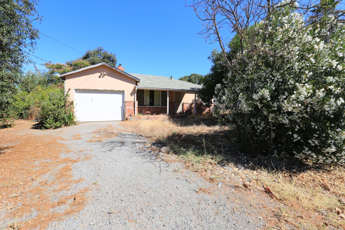 3245 Roop Road Gilroy, CA 95020 - Photo 14 of 35 a view of a house with a yard