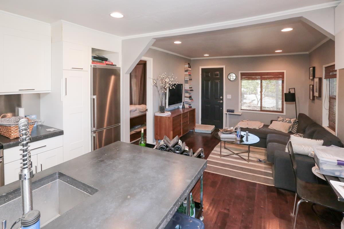 3245 Roop Road Gilroy, CA 95020 - Photo 16 of 35 a living room with furniture and a flat screen tv