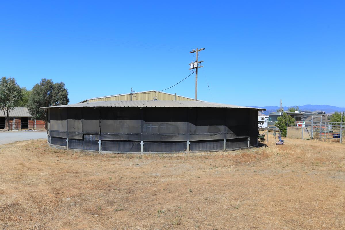3245 Roop Road Gilroy, CA 95020 - Photo 25 of 35 a backyard of a house with table and chairs