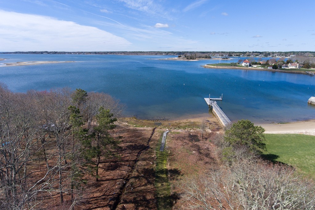 534 D Point Road Marion, MA 02738 - Photo 3 of 28 a view of a lake with a mountain