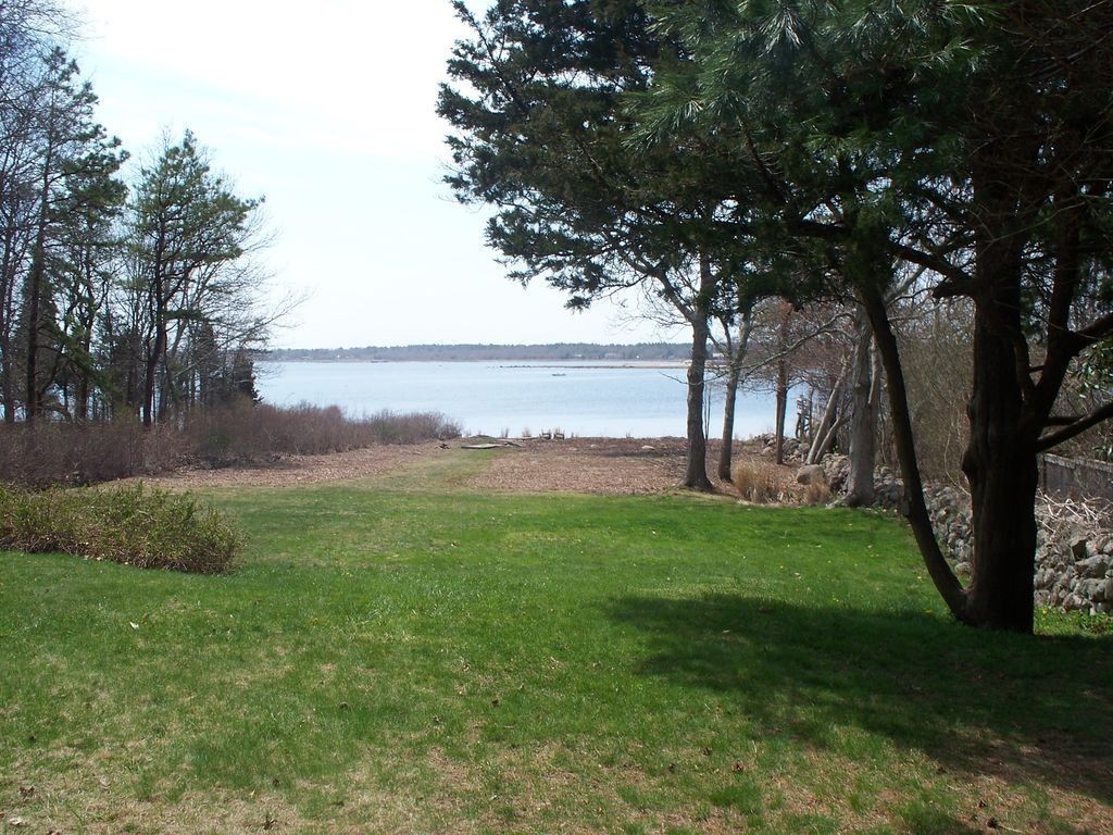 534 D Point Road Marion, MA 02738 - Photo 8 of 28 a view of a garden with a tree