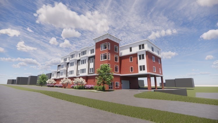 680 Worcester Street, Unit 102 Wellesley, MA 02482 - Photo 1 of 1 a front view of a house with a garden