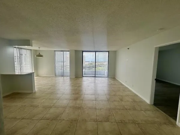 a view of a livingroom with a staircase