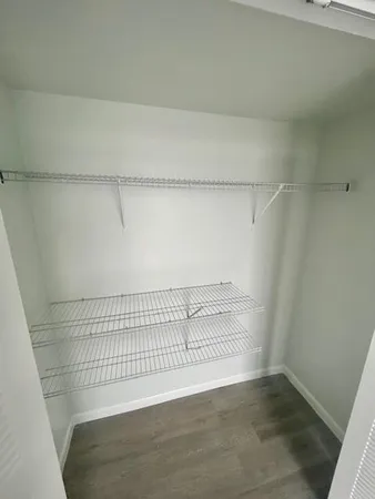 a view of swimming pool with seating area