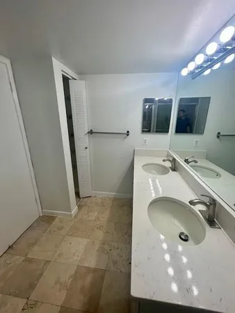 a bathroom with a shower and toilet